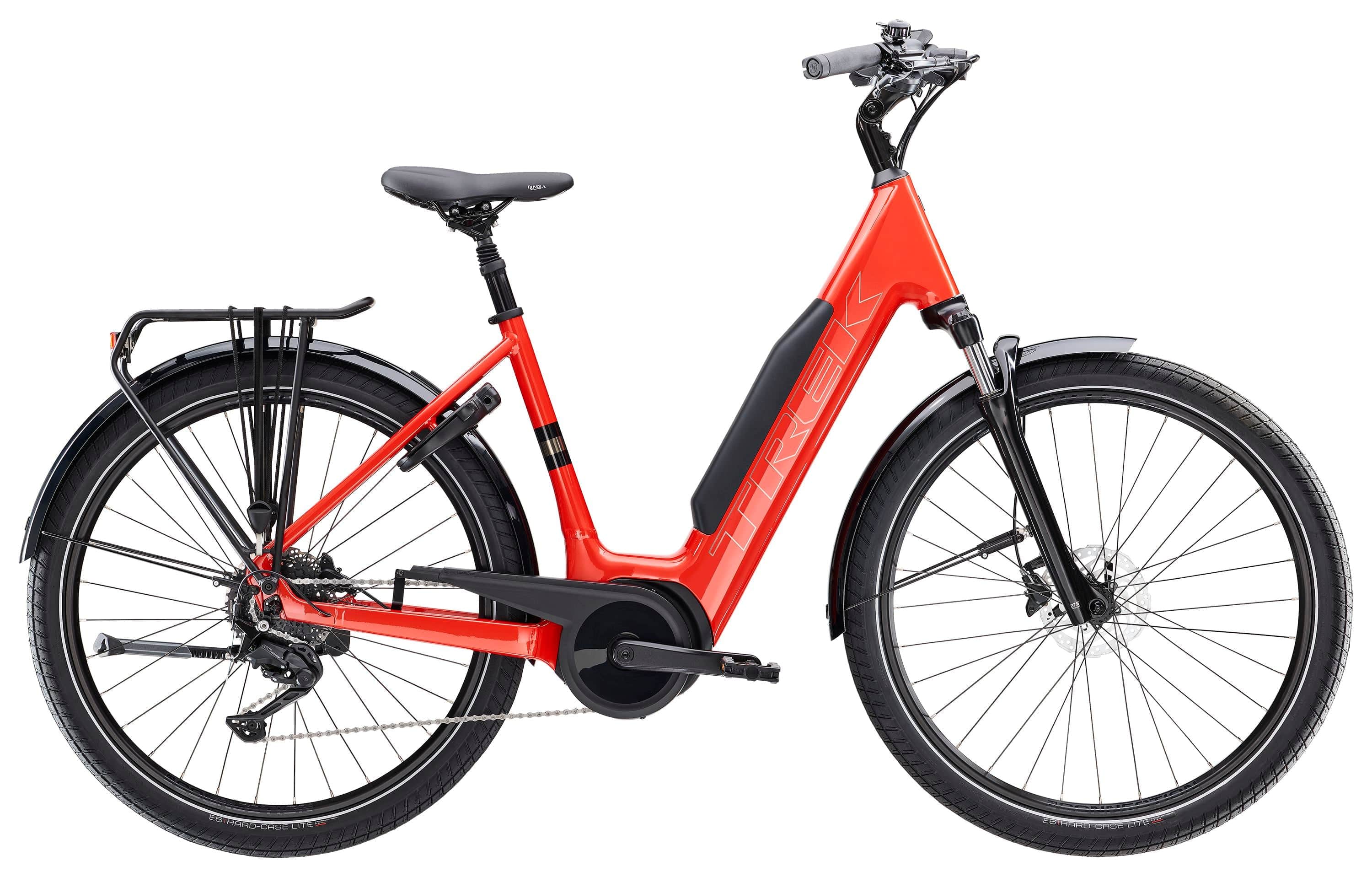 Trek Verve+ 3 Lowstep electric hybrid bike for urban commuting with a comfortable frame and pedal assist in a city setting.