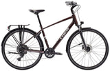 Trek Verve Equipped hybrid bike with Shimano CUES drivetrain and LINKGLIDE technology, featuring a step-over frame and 26-inch wheels.