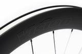 Vision SC 60 SL i23 disc carbon wheelset for Shimano 11/12-speed road bikes, shown with sleek black carbon rims and disc brakes.