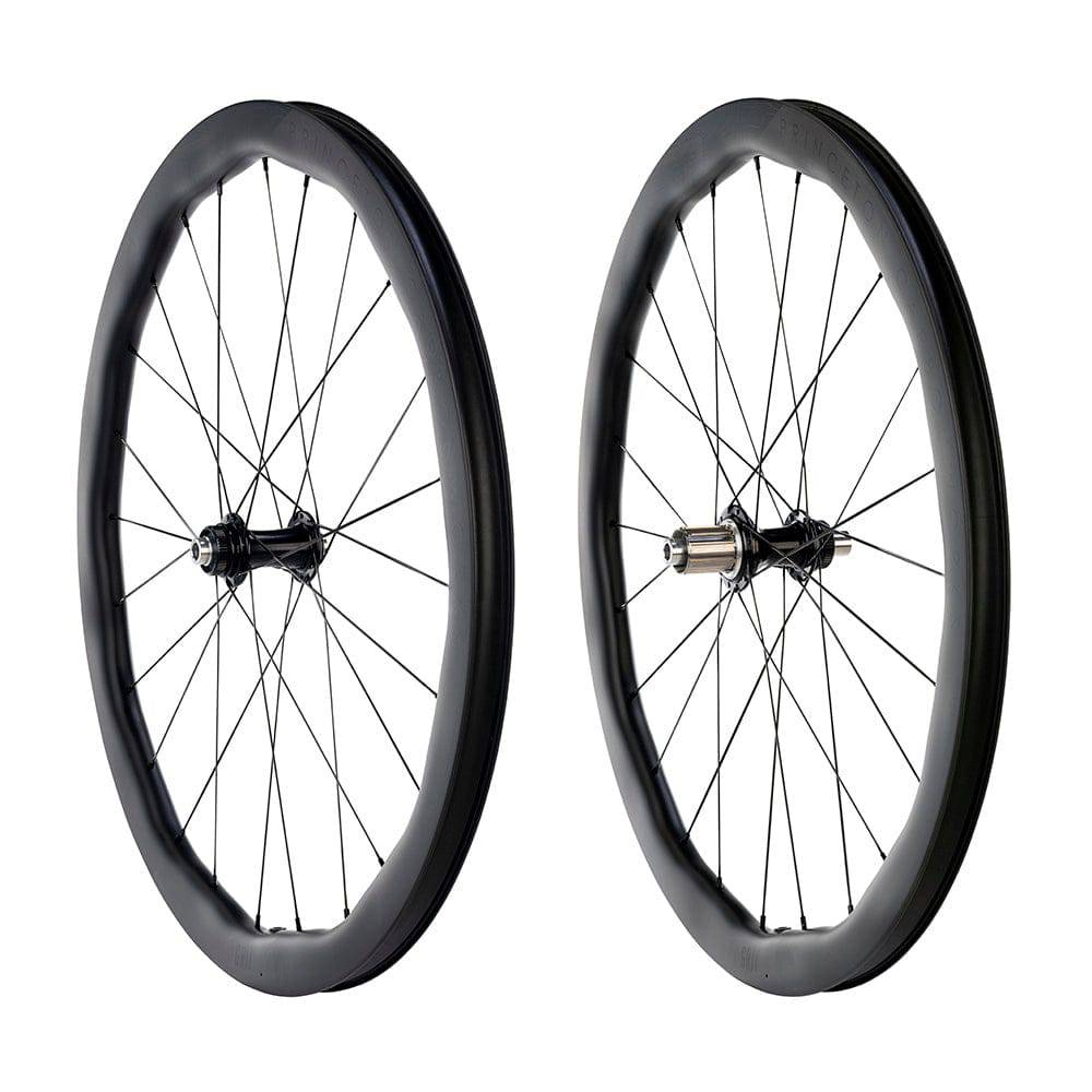 Princeton CarbonWorks Grit Evo 4540 disc wheelset with white Industries hubs, designed for gravel and road racing.