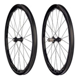 Princeton CarbonWorks Grit Evo 4540 disc wheelset with white Industries hubs for gravel and road racing bikes.