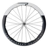 Princeton CarbonWorks Peak 4550 Evo road wheelset with Tactic hubs and white graphics, lightweight carbon cycling components.