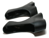 Pair of Shimano ST-R3000 bracket covers for shifters, genuine replacement components for bicycle gear shifting.
