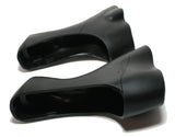 Pair of Shimano ST-R3000 bracket covers for shifters, genuine replacement components for bike gear shifting.