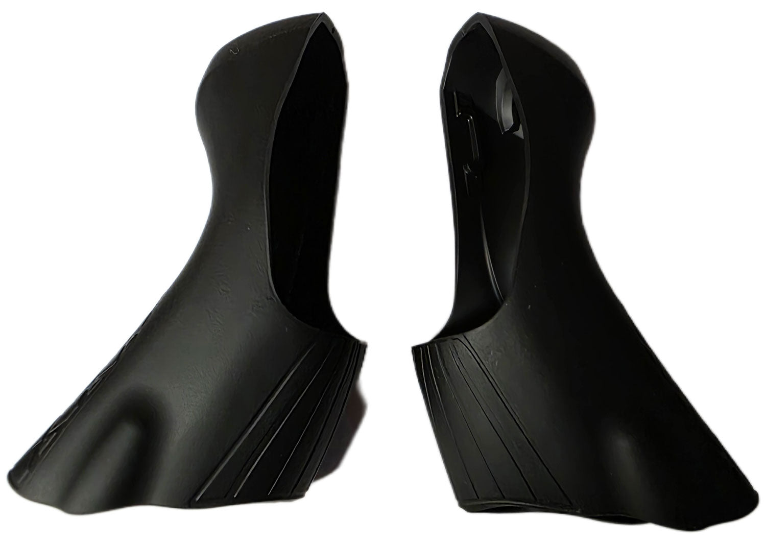 Pair of Shimano Dura-Ace ST-9100 bracket covers for shifter protection and replacement, shown in a close-up view.