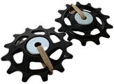 Shimano SLX RD-M7100 tension and guide pulley set for mountain bike derailers, showing the pulleys with mounting hardware.