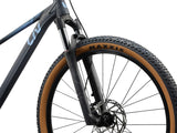 Liv Tempt 29 1 women's mountain bike with Shimano CUES U6000 drivetrain and ALUXX aluminum frame, shown on trail.