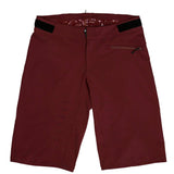 Race Face Indy Women's All-Mountain Shorts 2021 with venting and adjustable waistband, shown in a versatile outdoor setting.