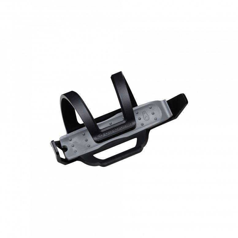 Crankbrothers BC2 SOS bottle cage with integrated tire repair tools in black and silver, suitable for bike workshop use