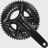 Shimano 105 FC-R7100 double 12-speed hollowTech II road bike crankset with chainrings and crank arms.