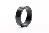 FBI Carbon 1 1/8-inch bike headset spacer, 10mm height, lightweight component for bike headset adjustment, shown in image.