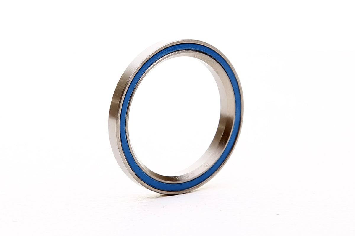 FBI P16 52mm 45/45 headset bearing for bike steering, showing the smooth, precision-machined component with bearing surfaces.