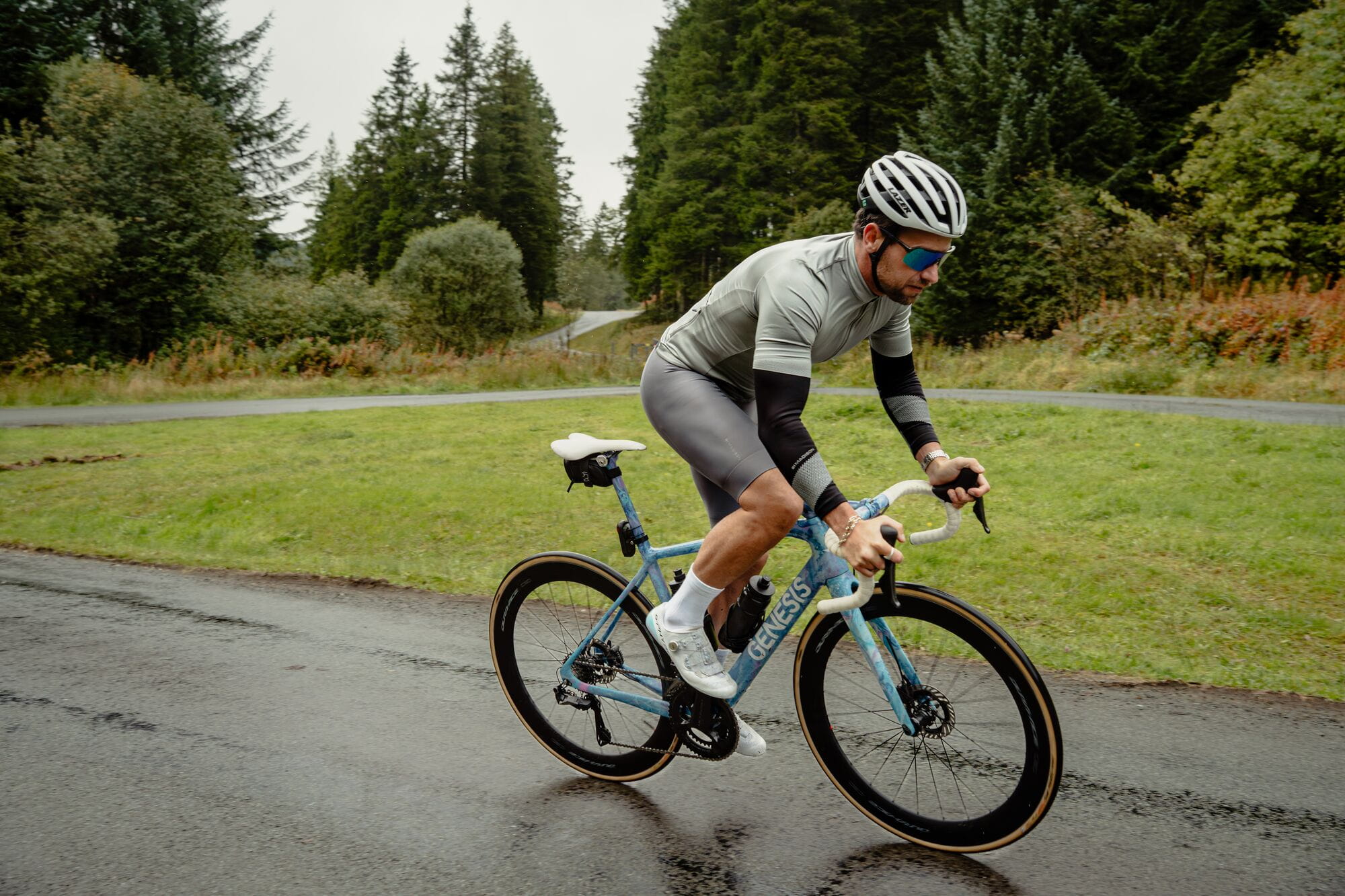 Madison Flux men's Lycra cycling bib shorts with EIT dual-density pad, close-up of black and red race-style sportswear.