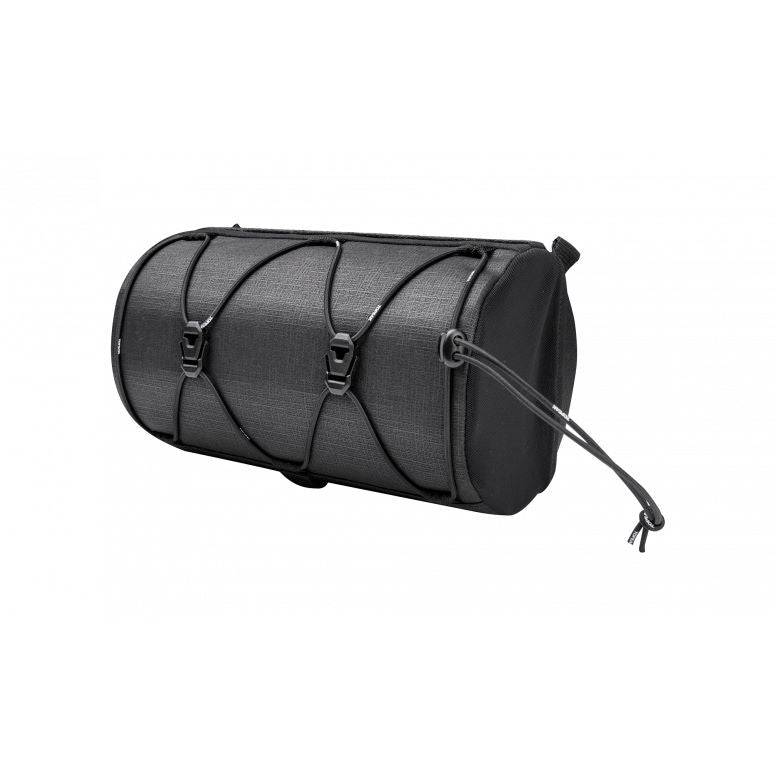 Topeak Tubular Barbag handlebar bag mounted on a bicycle, water-resistant cycling accessory with storage compartments.