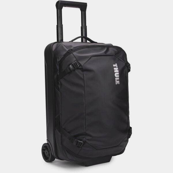 Black Thule Chasm Carry On wheeled suitcase with durable design and oversized wheels, ideal for travel accessories.