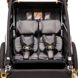 Burley Premium seat pad for child trailers featuring cushioned comfort and adjustable headrest for enhanced support.