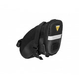 Topeak Aero Wedge Strap Mount bike seat pack with pump holder and reflective strips, designed for secure cycling storage