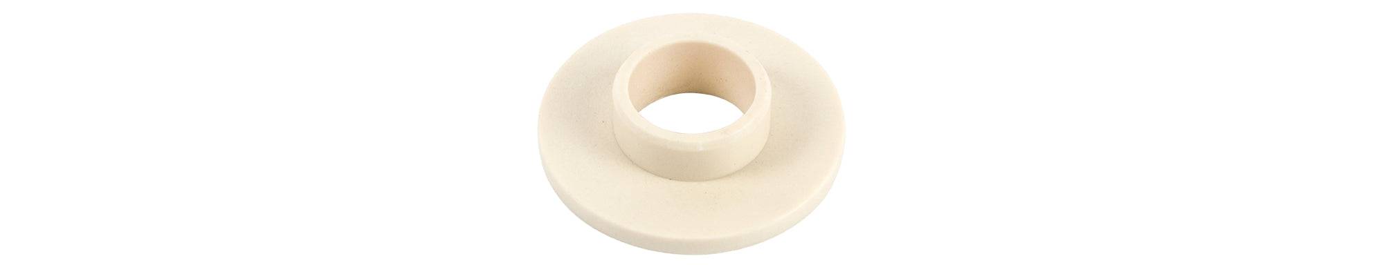 Yellow Trek main axle pivot bushing top hat for full suspension frames, component part for bike maintenance and repair.