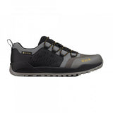 Fizik Terra Ergolace GTX waterproof flat MTB shoes with Vibram outsole, featuring black and gray design and breathable material.