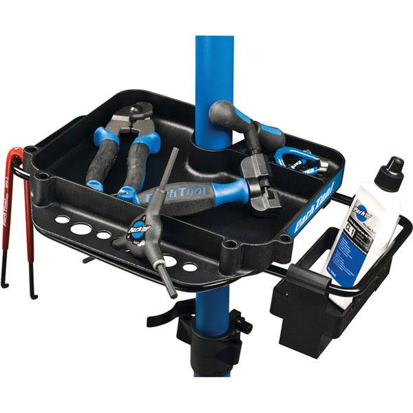 Park Tool 106 repair stand work tray with tool organizer and lube holder, designed for workshop bike maintenance.