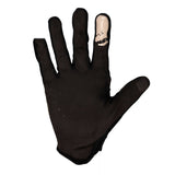 Race Face Trigger MTB gloves with breathable perforated palm and sweat-absorbing thumb panel for comfortable mountain biking.