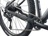 Giant Talon 29 1 mountain bike with Shimano CUES U6000 disc brakes, unisex design, black frame, and knobby tires for off-road riding.
