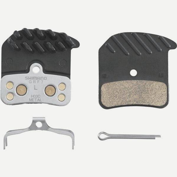 Shimano H03C-MF metal sintered disc brake pads with spring and cooling fins for 4-piston mountain bike brake components.