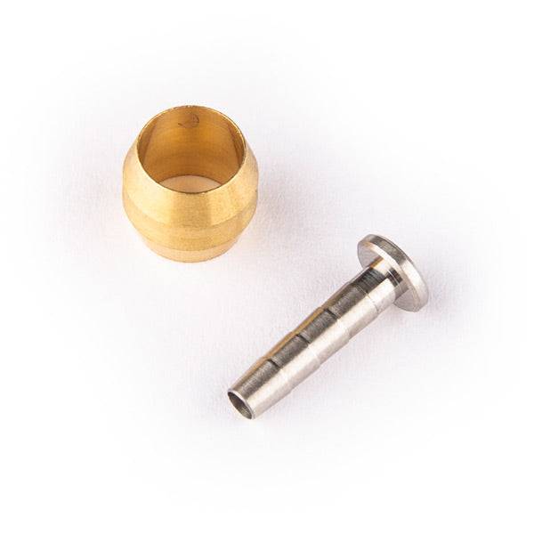 Shimano SM-BH90 olive and connector insert for 2.1mm bore brake systems, shown in close-up with brake components.