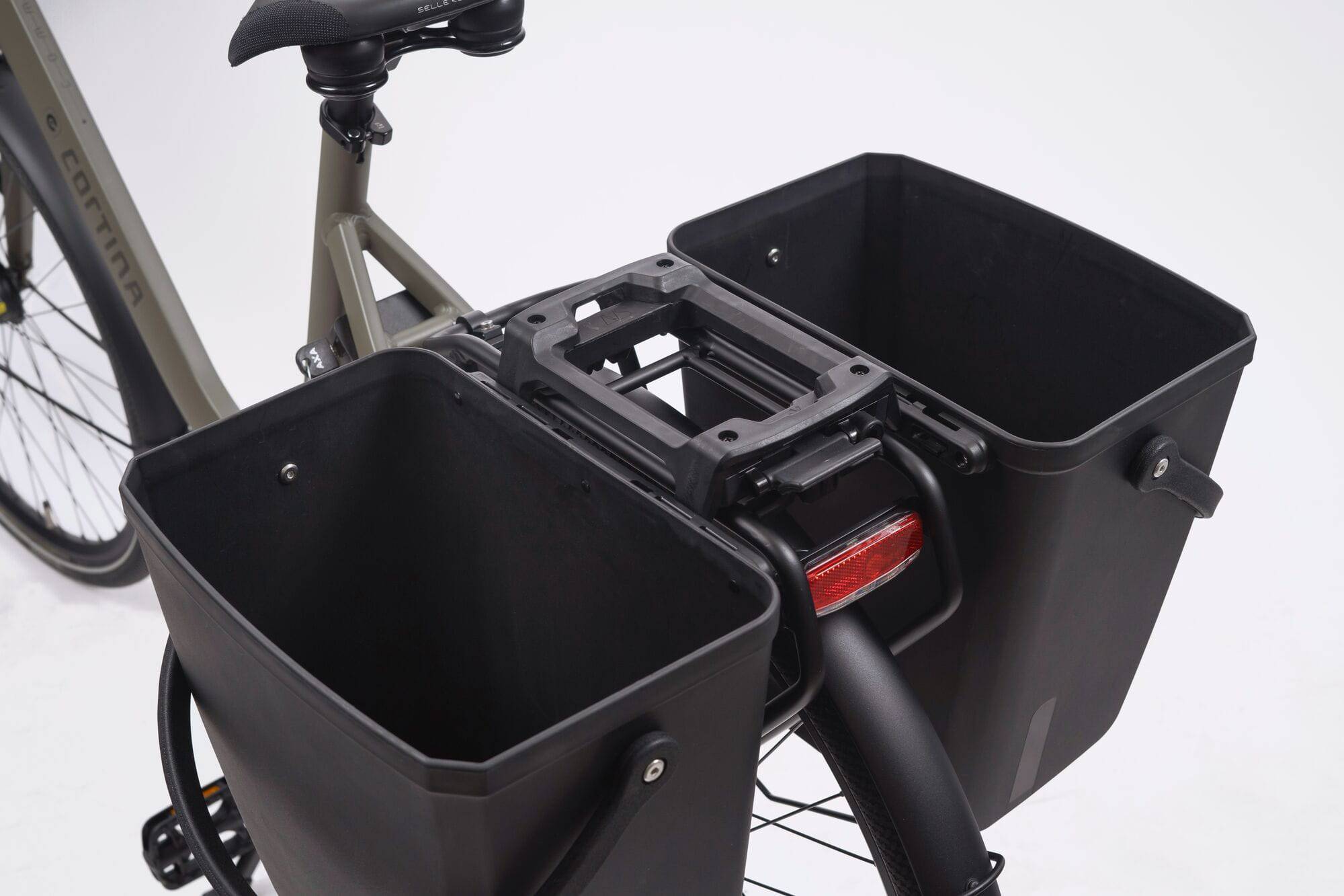 AtranVelo Carry AVS side box pannier with 22L capacity, mounted on a bike with Triple-X system, showing its durable, weather-resistant design.