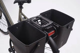 AtranVelo Carry AVS side box pannier with 22L capacity, mounted on a bike with Triple-X system, showing its durable, weather-resistant design.