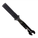 DMR Bikes pedal spanner tool with 15mm wrench and deathgrip handle for bike maintenance, shown in a workshop setting