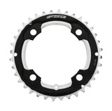 FSA Pro MTB chainring 104x44T for Brose eBike, black CNC machined 4-hole component with intricate design and mounting holes.