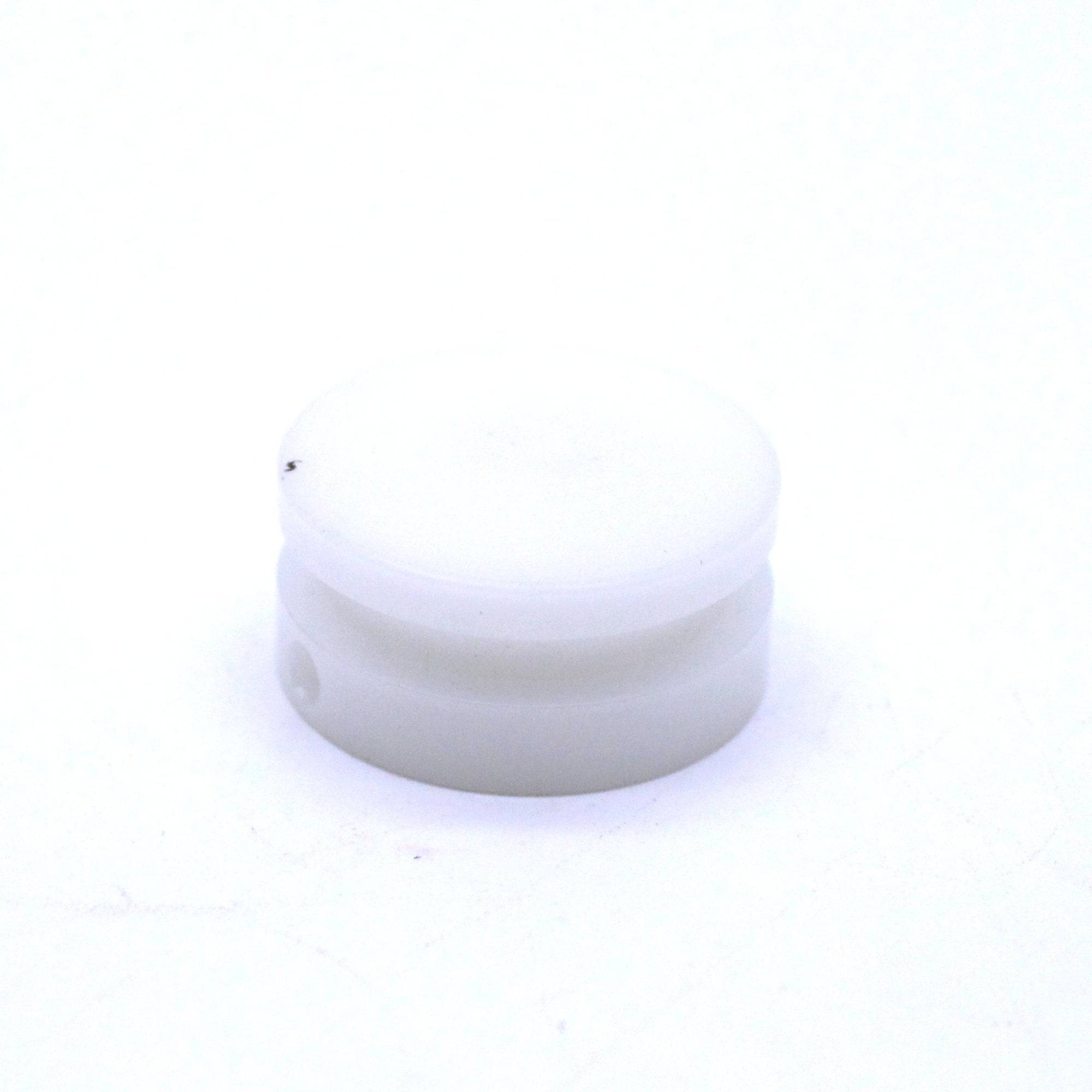 Fox Shock Float 125-130 acetal copolymer piston spare for rear shock suspension, shown in close-up view of component.