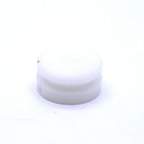Fox Shock Float 125-130 acetal copolymer piston spare for rear shock suspension, shown in close-up view of component.