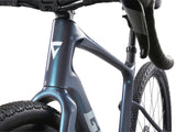 Giant Revolt Advanced 1 gravel bike with adjustable wheelbase and integrated storage compartment, ready for off-road cycling.