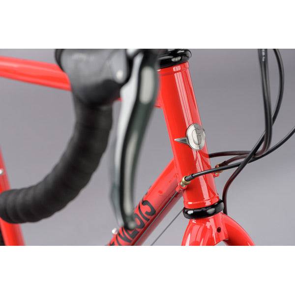 Genesis Croix De Fer 20 Alt Adventure Bike with Shimano GRX drivetrain and tubeless-ready wheels, designed for versatile riding.