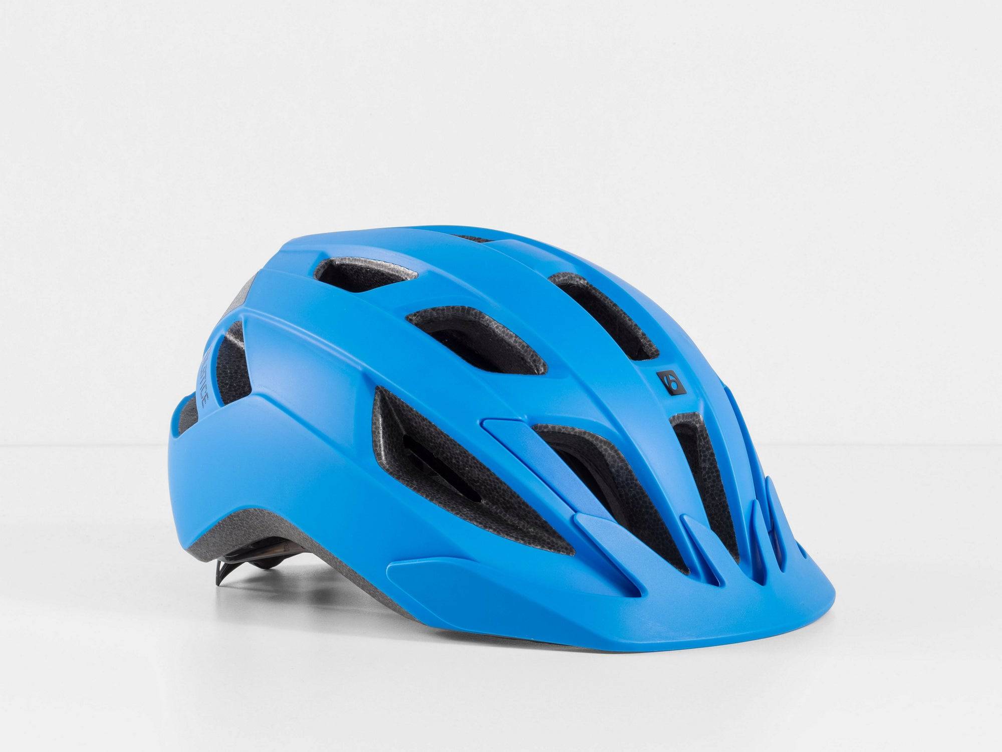 Bontrager Solstice MIPS bike helmet with adjustable fit, visor, and magnetic buckle, shown from the side.