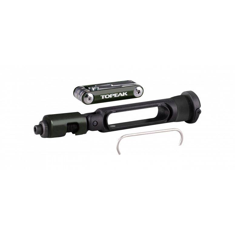 Topeak BB Hide n Tool black compact MTB bottom bracket multi-tool with 7 functions, shown in a workshop setting