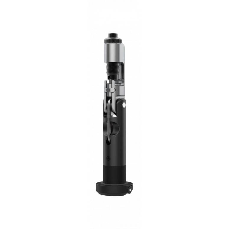 Topeak Plug n Chain 13s black compact MTB chain repair tool for 13-speed chains, shown in workshop setting