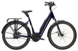 Trek District+ 5 Lowstep 2025 urban commuter e-hybrid bike with step-through frame and electric assist for city riding.
