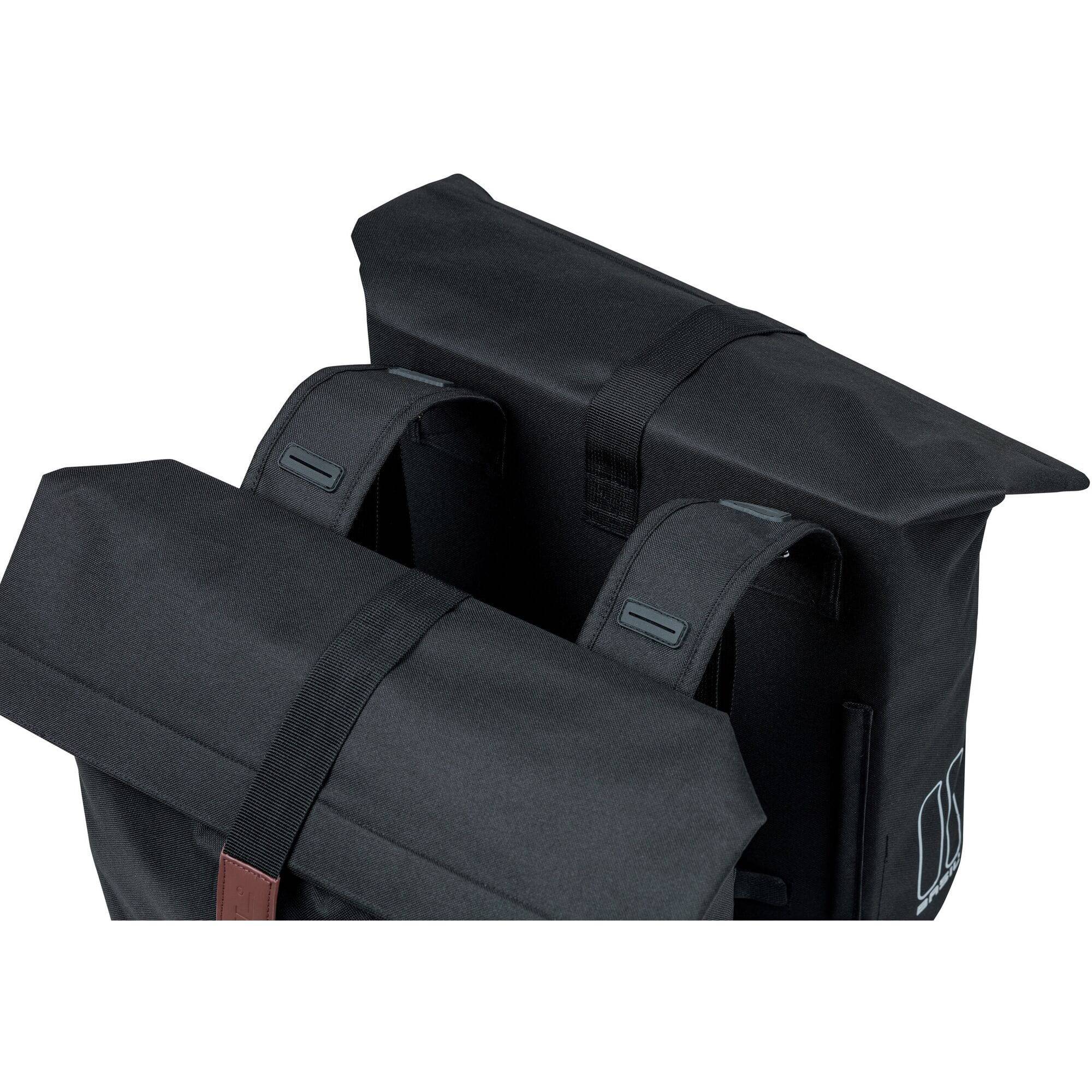 Black Basil City Double Bicycle Bag with reflective panels, water-repellent pannier, suitable for 28-32L bike accessories.