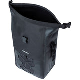 Basil Navigator waterproof single pannier bag with MIK hooks system mounted on a bicycle rack for cycling accessories.