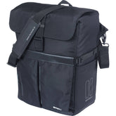 Black Basil Move commuter bicycle bag with 15L capacity, laptop compartment, rain cover, and MIK studs for easy attachment.