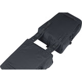 Black Basil Move Double Bicycle Bag with rain cover, 30L pannier for commuting and cycling, shown attached to bike.