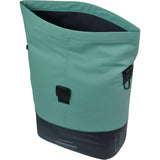 Waterproof Basil Cove Shopper bike bag with MIK hooks, shown attached to a bicycle, designed for urban commuting and accessories.