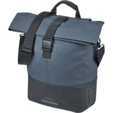 Basil Basil Cove Shopper bike bag with waterproof fabric, MIK hooks, designed for urban commuters, on a bicycle.