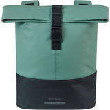 Basil Cove double pannier bag in water-repellent fabric attached to a bicycle for commuting storage accessories.
