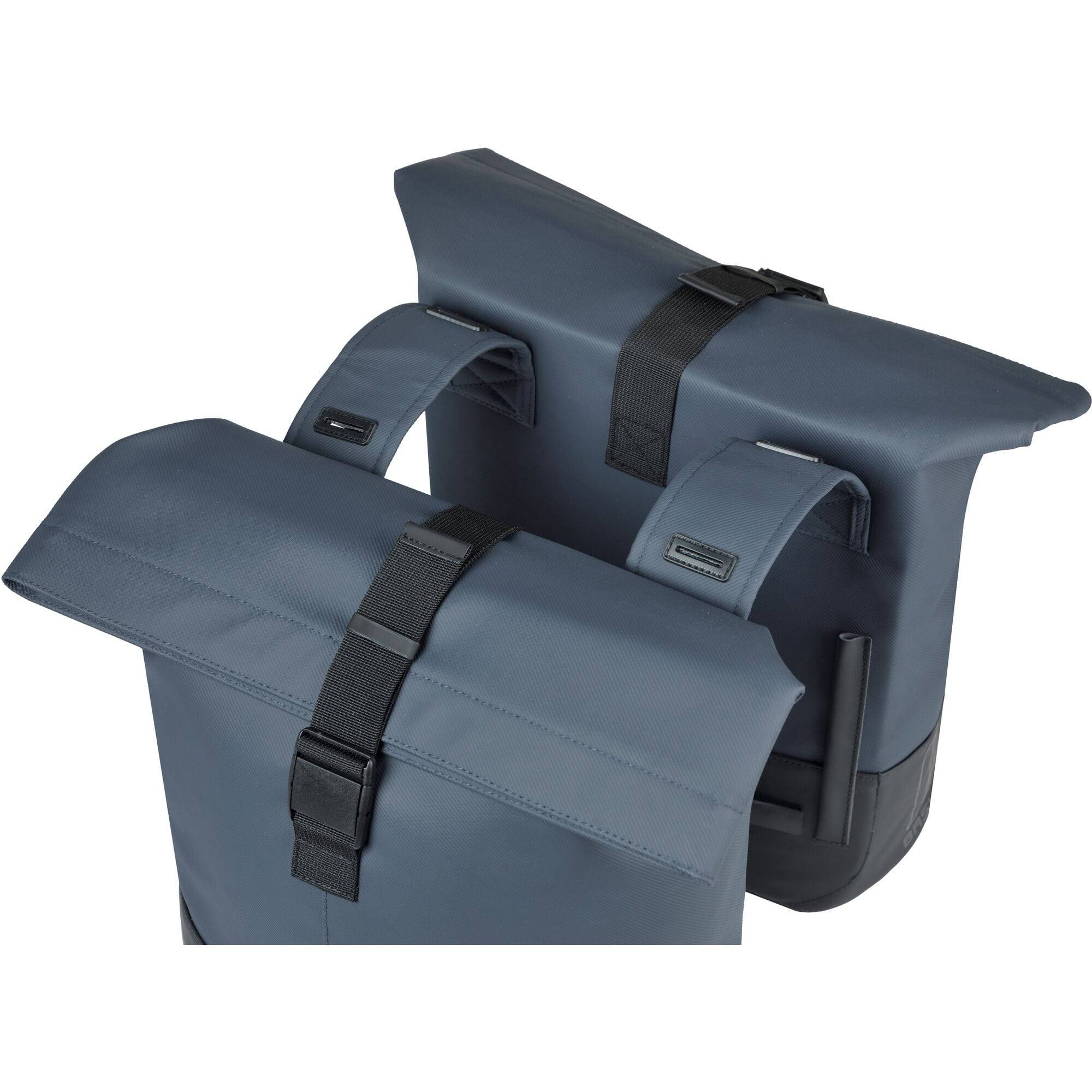 Basil Cove double pannier bag for bikes, water-repellent commuting luggage with sturdy straps and sleek design.