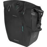 Basil Rivo L tarpaulin rear bike bag with MIK hooks and removable strap, designed for easy attachment and durable cycling storage.