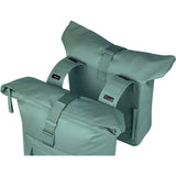 Basil Brooklyn double pannier bag in silver-green, 41L waterproof urban commuter bag with multiple compartments and reflective details.
